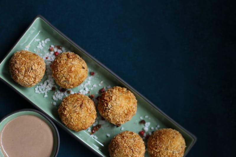Arancini rice balls with marinara dipping sauce