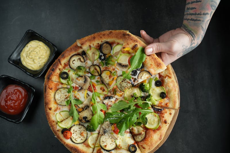 Four cheese pizza with mozzarella, gorgonzola, and parmesan